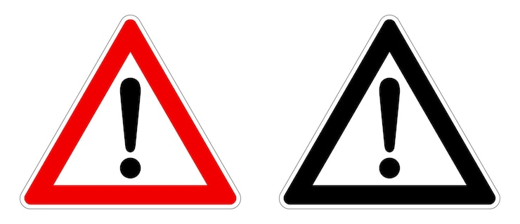 Vettore segnale di avvertimento/attenzione. punto esclamativo nel triangolo. versione rosso/nero e bianco.