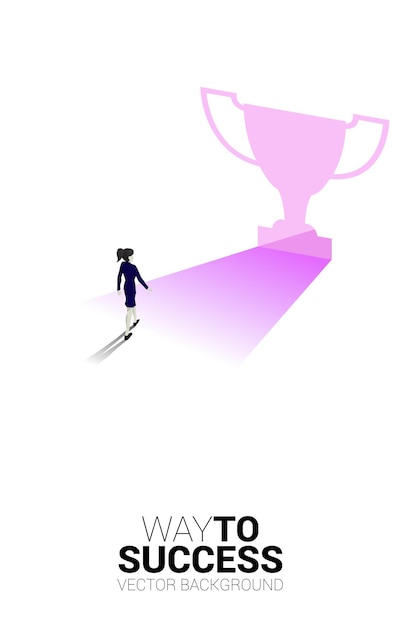 Silhouette donna d'affari che cammina alla luce dal trofeo di forma della porta di uscita Business Concept del percorso verso il vincitore e il campione