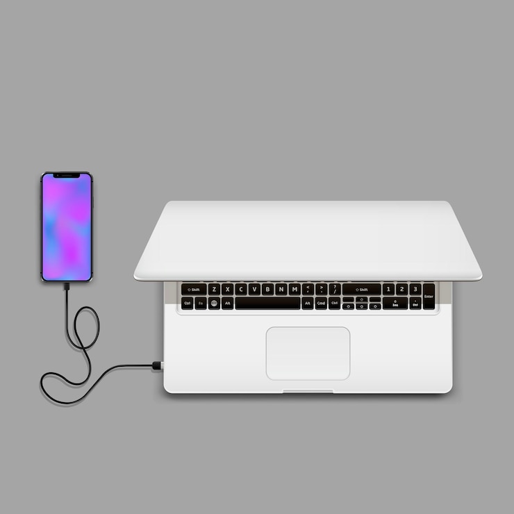 Vettore smartphone collegato al computer portatile tramite cavo usb