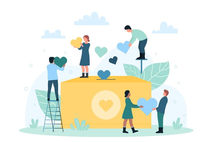 sostegno alla carità e aiuto dalla comunità piccole persone tengono i cuori vicino alla scatola delle donazioni