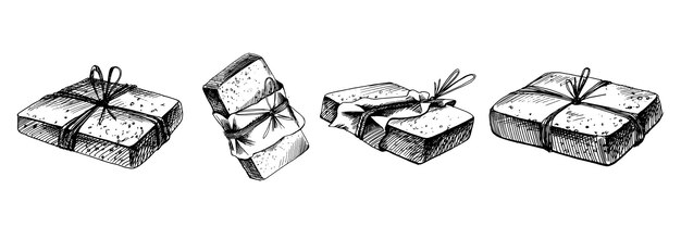 Un disegno in bianco e nero di due scatole di regali e una di esse ha un nastro legato intorno alla parte superiore.