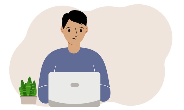 Un uomo sta lavorando o studiando su un portatile Freelancing o apprendimento a distanza e concetto di lavoro
