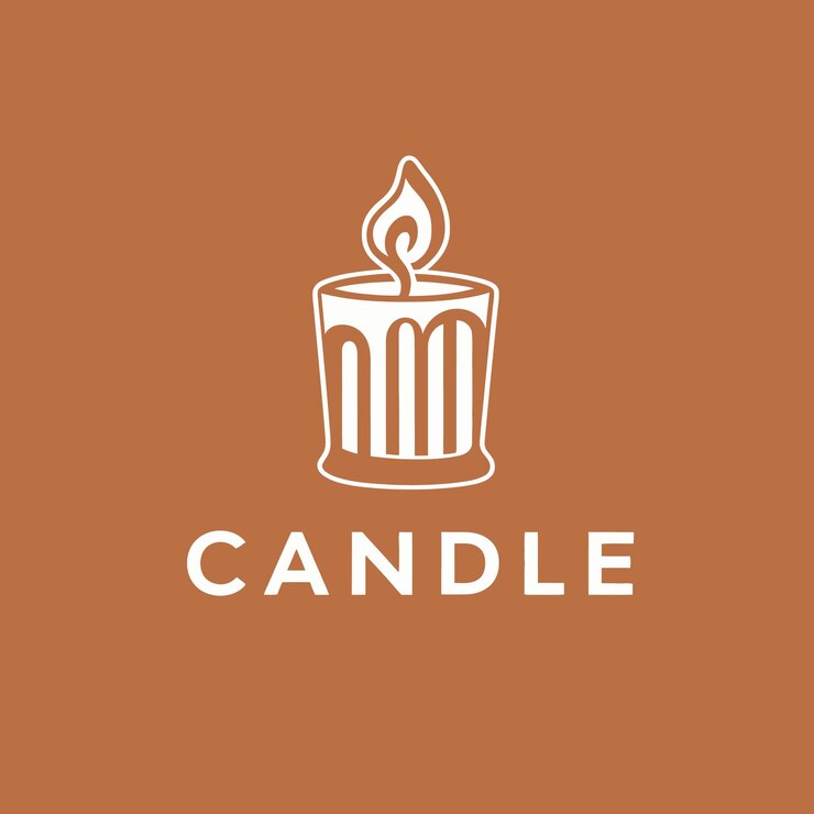 una candela che è su uno sfondo marrone