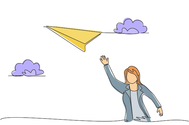 Una giovane donna d'affari con disegno a linea continua singola vola con un aereo di carta fino al vettore del cielo