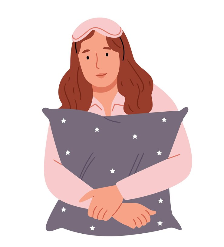 Una ragazza con una maschera da sonno tiene un cuscino nelle mani