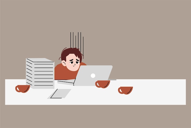 Uomo stanco di lavorare sodo, esaurimento a causa del lavoro, ragazzo in ufficio seduto al tavolo con il laptop e