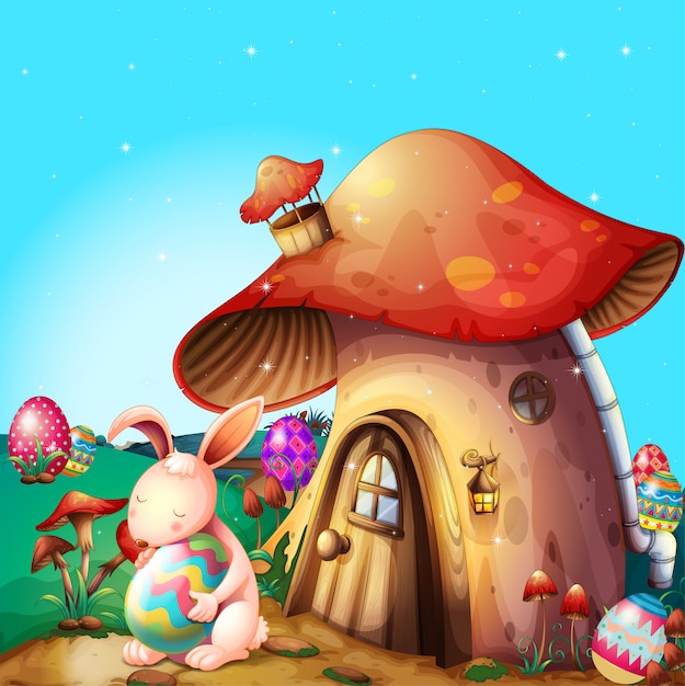 Uova di Pasqua nascoste vicino a una casa a forma di fungo