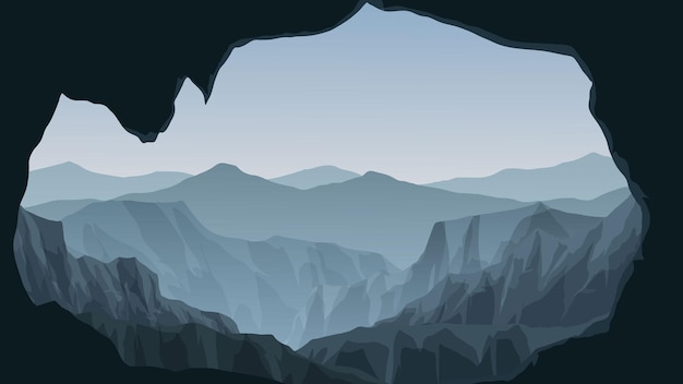 Vista sulle montagne nebbiose dalla grotta