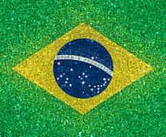 Gratis foto 3d achtergrond van de vlag van brazilië met glitter effect