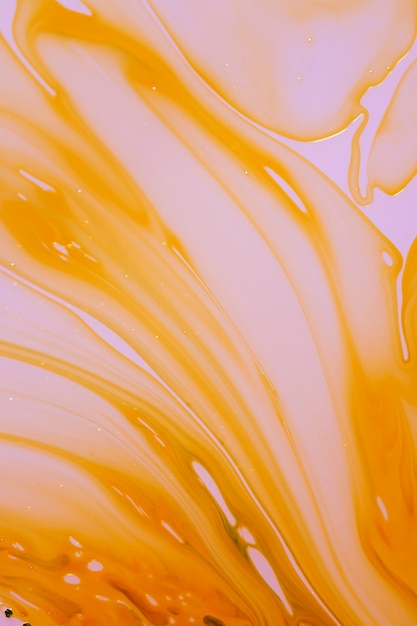 Gratis foto abstract uitgelekte oranje lagen