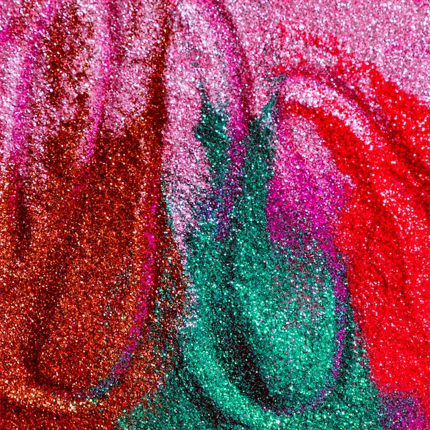 Gratis foto abstracte achtergrond van een glitter kleuren