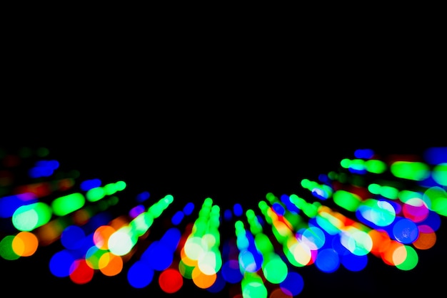 Abstracte bokehachtergrond met kleurrijke lichten