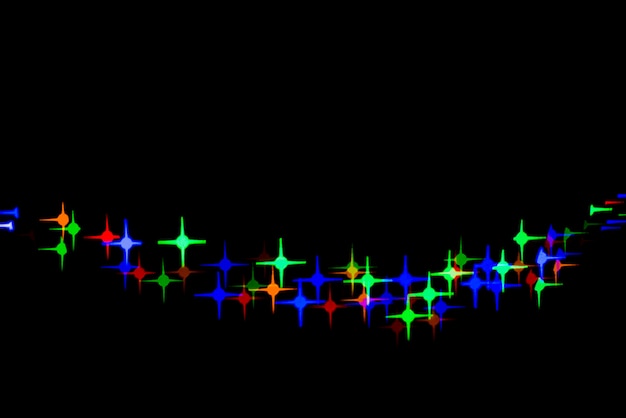 Abstracte bokehachtergrond met ster gevormde lichten