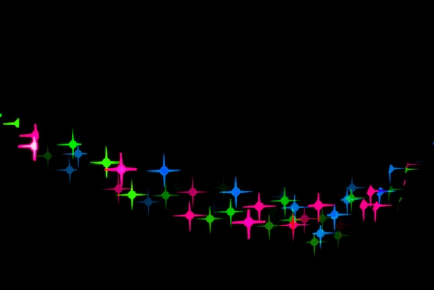 Abstracte bokehachtergrond met ster gevormde lichten