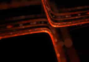 Gratis foto abstracte oranje gloeiende lijnen met bokeh-effect
