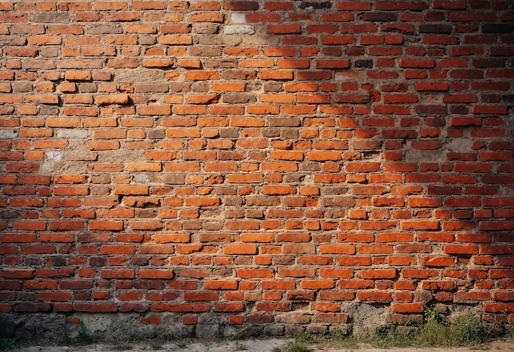 Gratis Foto achtergrond van bakstenen muur