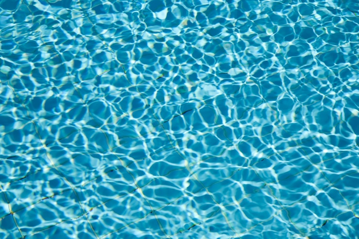 Gratis Foto achtergrond van water in het zwembad