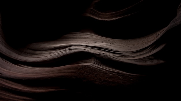 Adembenemend landschap van prachtige zand texturen in het donker in Antelope Canyon, USA