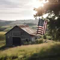 Gratis foto amerikaanse vlag vliegt van een oude schuur in het midden van een weide