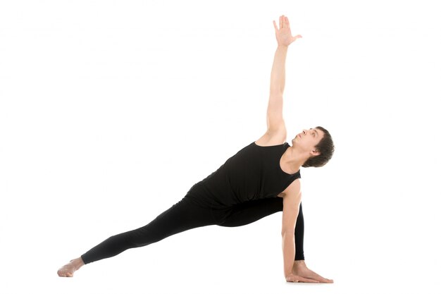 Atleet het doen van een yoga pose