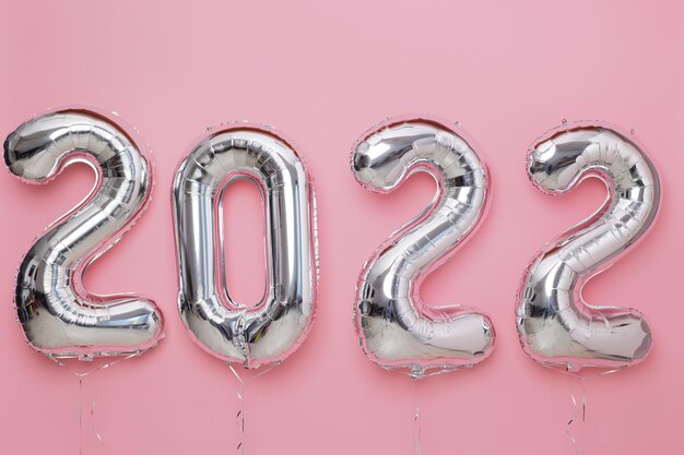 Ballon nummer nieuwjaar viering decoratieve design elementen roze achtergrond