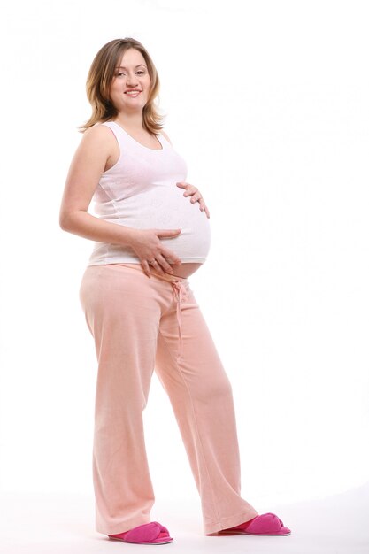 Beautyful gelukkige zwangere jonge vrouw