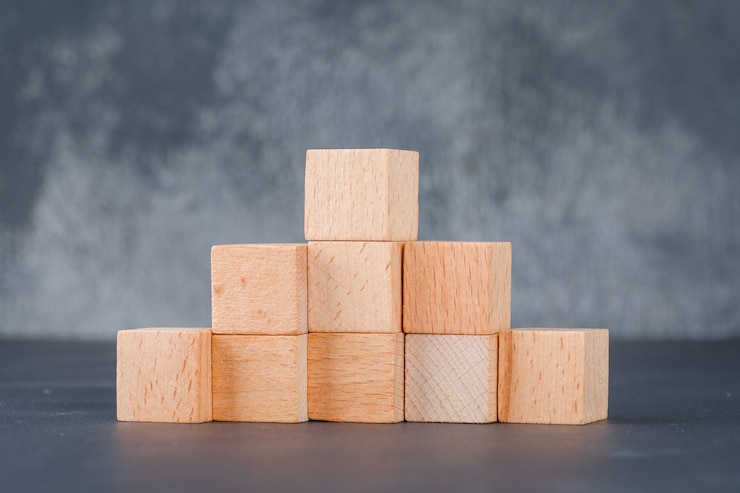 Gratis Foto bedrijfsconcept met houten blokken zoals trappen.