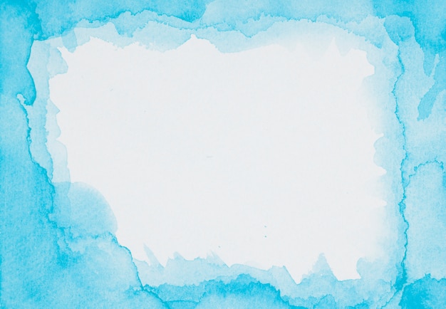 Gratis foto blauw frame van verven op wit blad