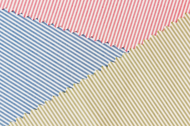 Blauw; rode en groene gebogen textielweefsel achtergrond