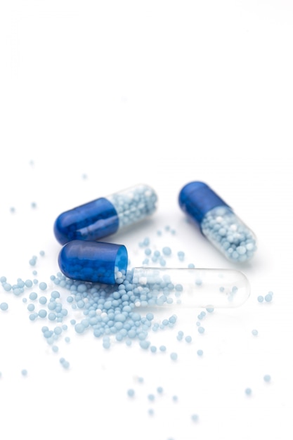 Blauwe capsules en pillenmuur