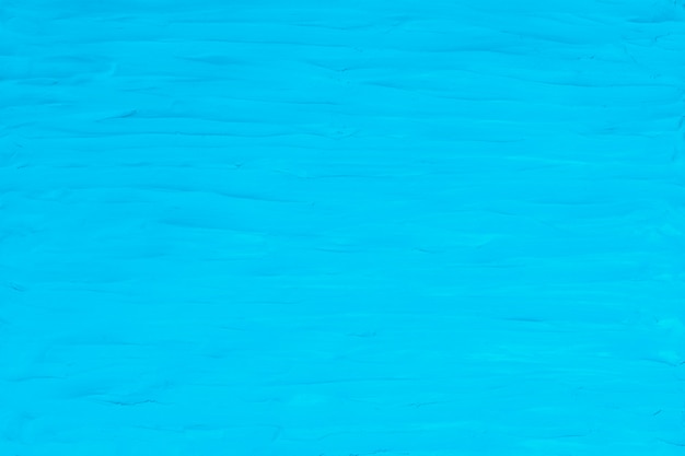 Gratis foto blauwe klei getextureerde achtergrond kleurrijke handgemaakte creatieve kunst abstracte stijl