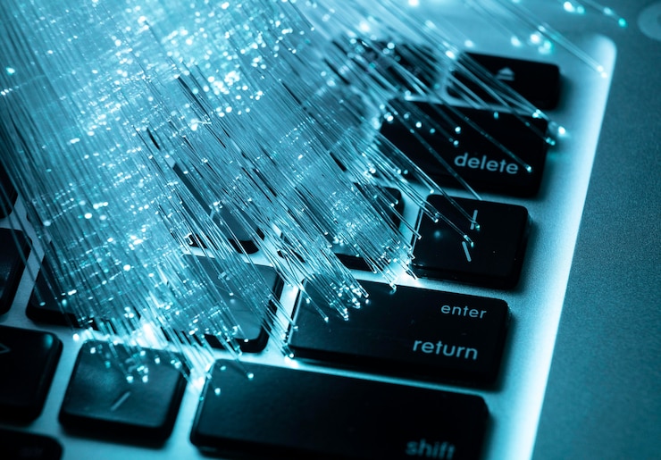 Gratis Foto blauwe optische vezel met laptop