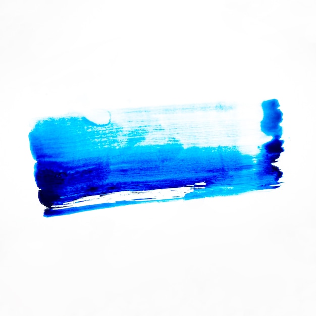 Blauwe penseelstreek op witte achtergrond