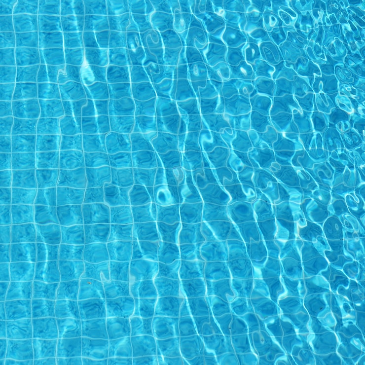 Gratis Foto blauwe rimpelende water achtergrond in zwembad