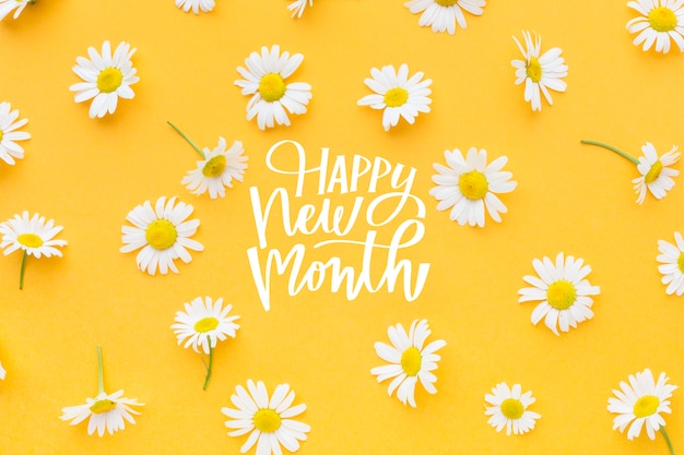 Gratis foto bloemenarrangement met happy new month-belettering