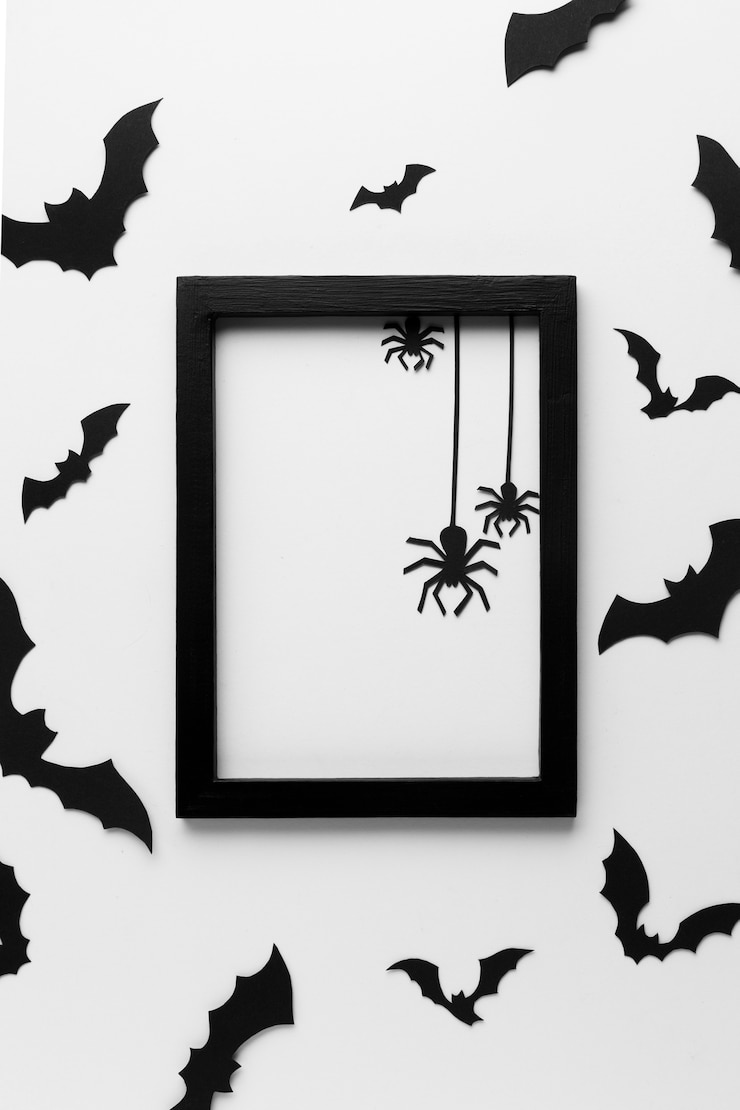 Gratis Foto bovenaanzicht halloween frame met spinnen