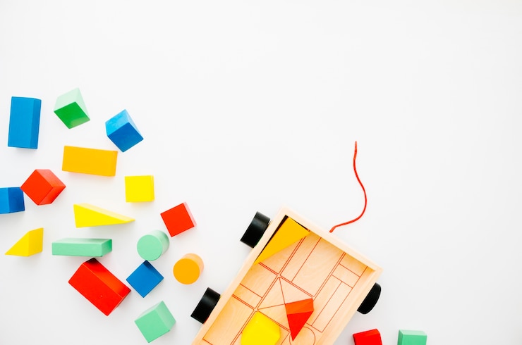 Gratis Foto bovenaanzicht houten kinderen speelgoed met kopie ruimte