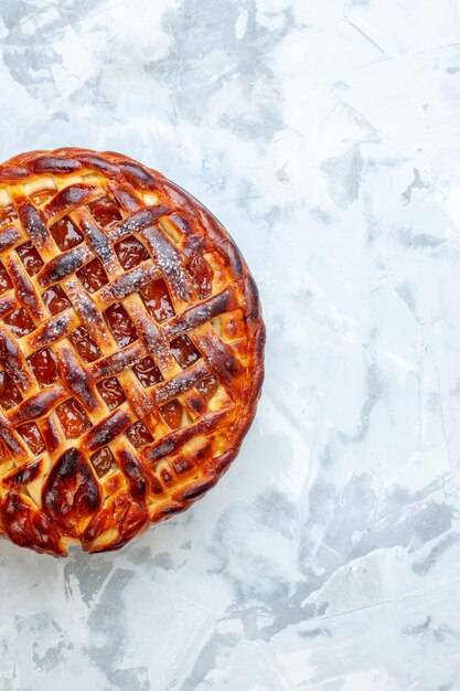 Bovenaanzicht lekkere fruitige taart met gelei op lichte biscuit cookie bake taart taart dessert kleur