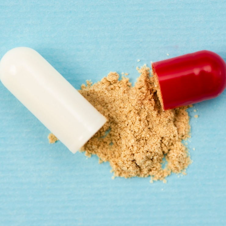 Gratis Foto bovenaanzicht pil capsule op blauwe achtergrond