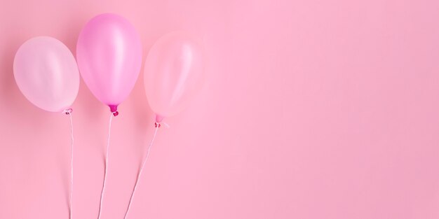 Bovenaanzicht roze ballonnen met kopie ruimte