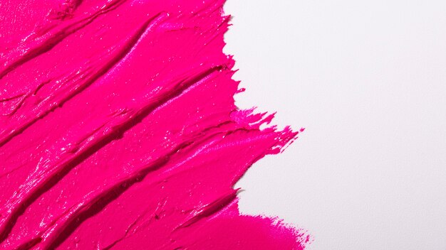 Bovenaanzicht roze lippenstift tinten textuur