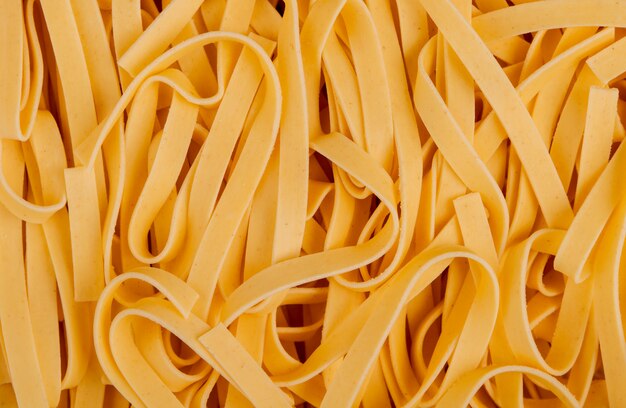 Bovenaanzicht van tagliatelle pasta als oppervlak