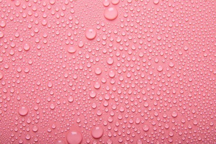 Gratis Foto bovenaanzicht watertextuur op roze