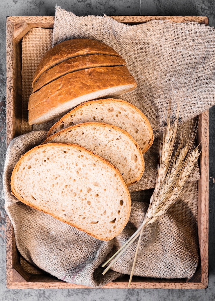 Gratis Foto bovenaanzicht zelfgemaakte sneetjes brood en tarwe