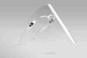 Gratis foto bril met afneembaar gelaatsscherm op een grijze achtergrond