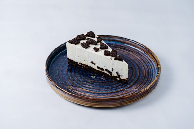 Cheesecake gegarneerd met oreokoekjes