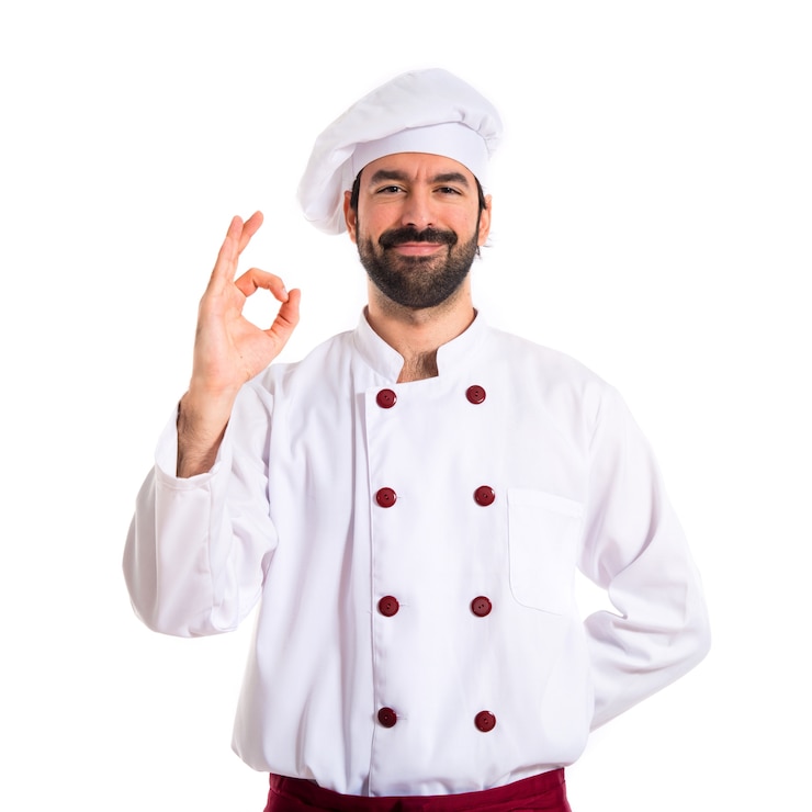Gratis Foto chef-kok maken ok teken op witte achtergrond