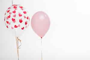 Gratis foto close-up artistieke ballonnen met hart cijfers