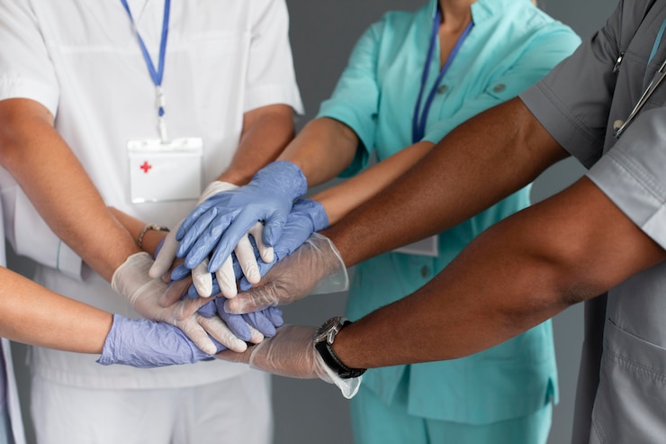 Gratis Foto close-up op team van gezondheidswerkers