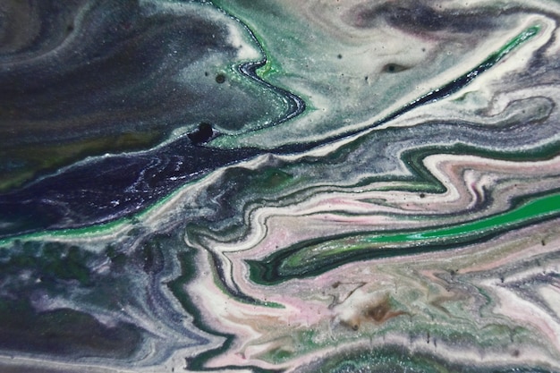 Close-up shot van abstracte patronen gemaakt met heldere verf gemengd in het water
